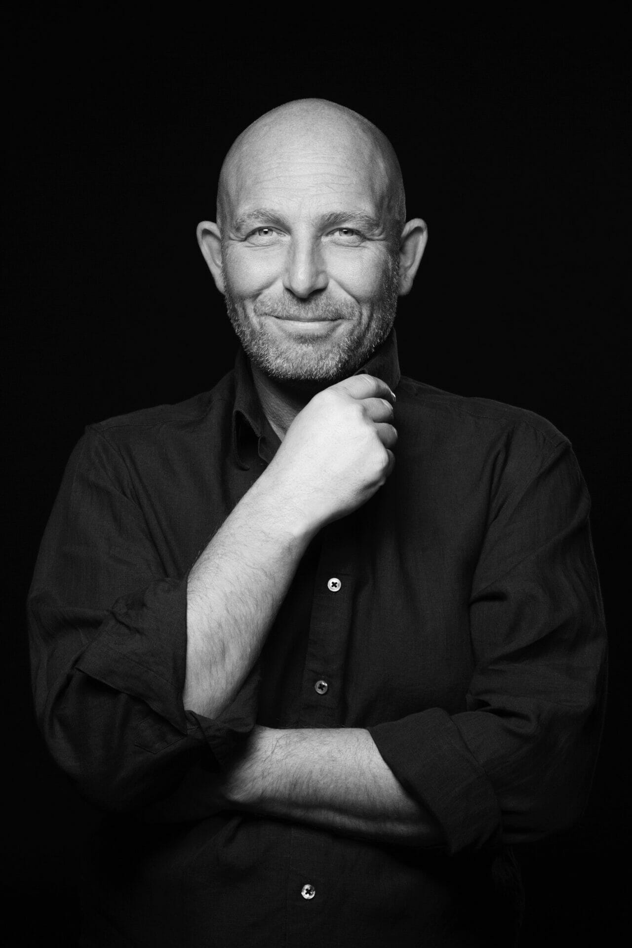 Mads Munk, CEO and Founder M2 Animation, black and white photo against a black backdrop